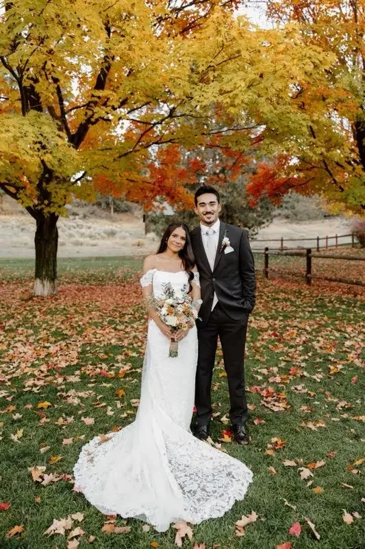 Photo of the real bride and groom smiling