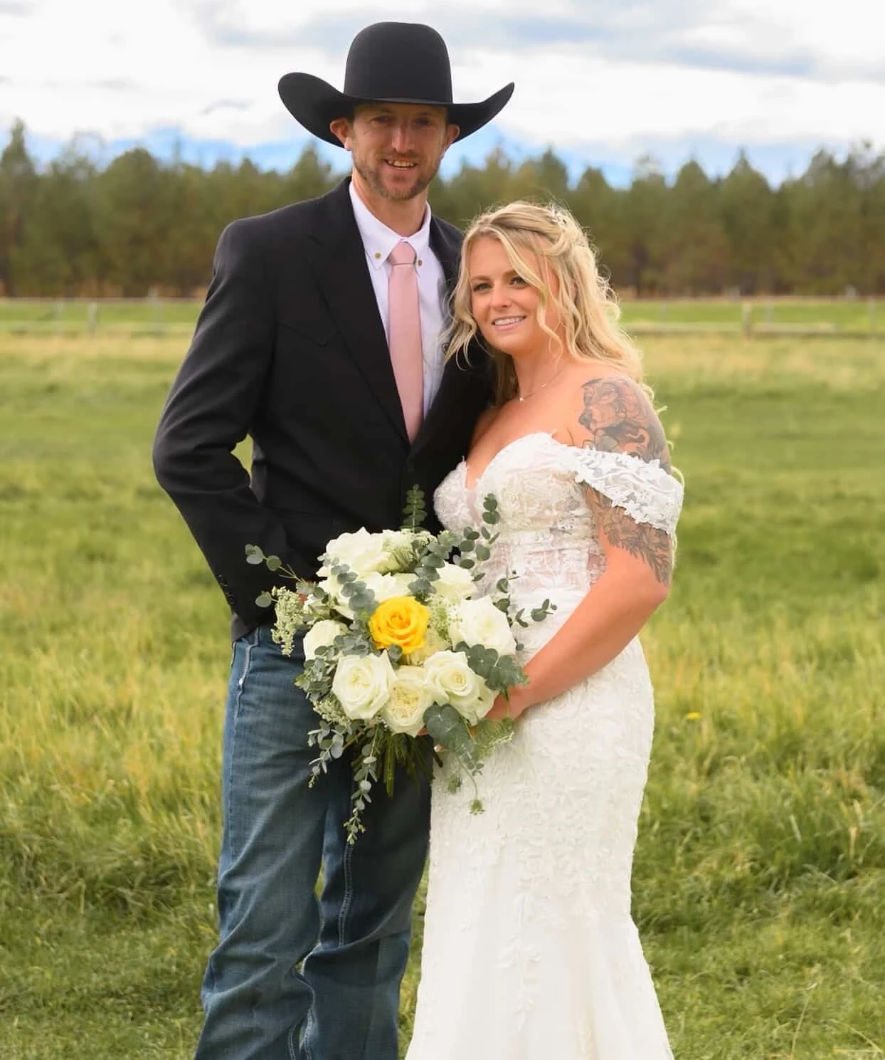 Photo of the real bride and groom smiling
